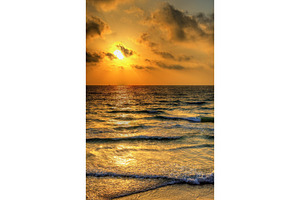 Sunset over the mediterranean sea off the coast of tel aviv stock photo, a Transportation Photo by Leonid Andronov