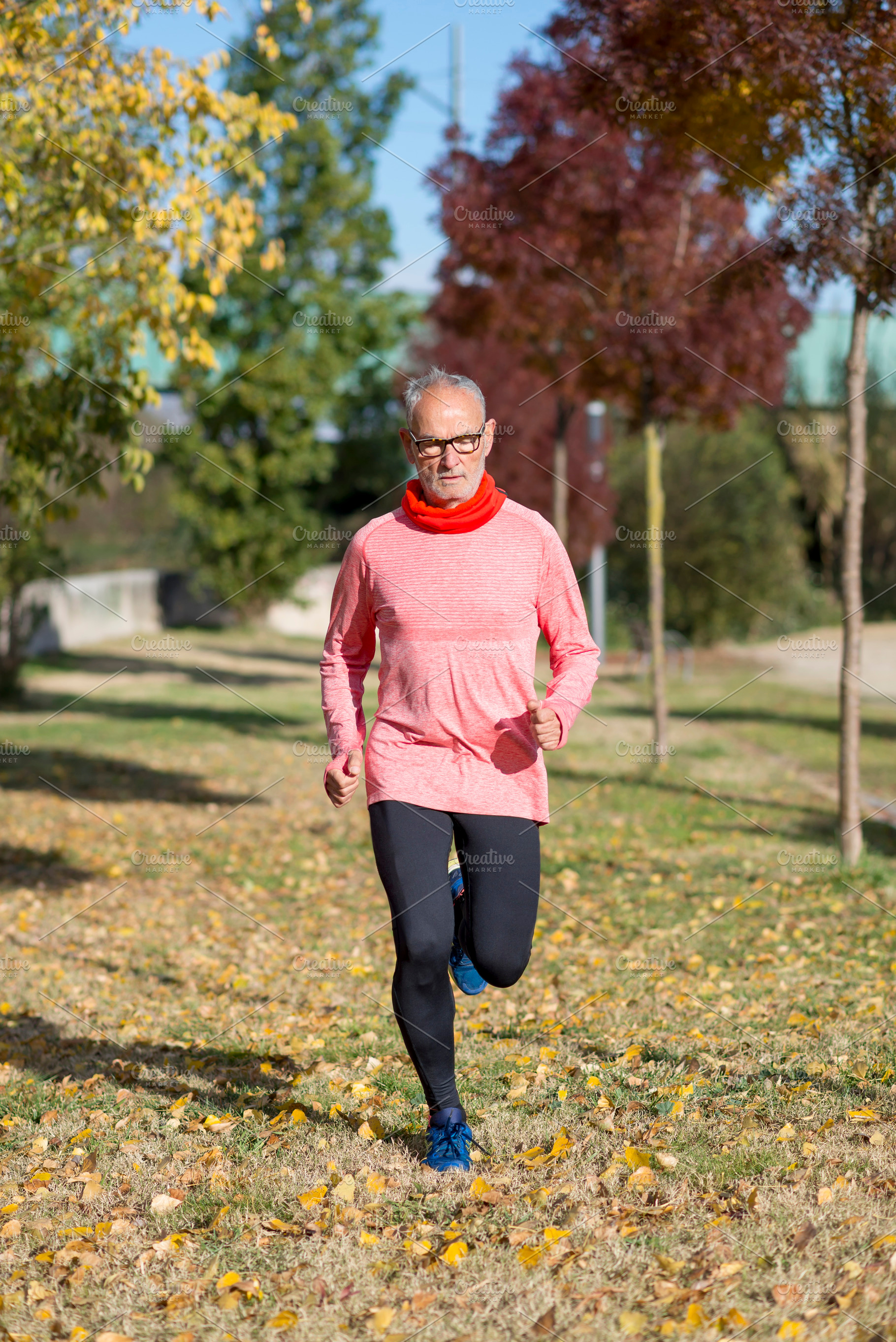 Senior man running outdoors in sportswear, a Sports & Recreation Photo by RF Images