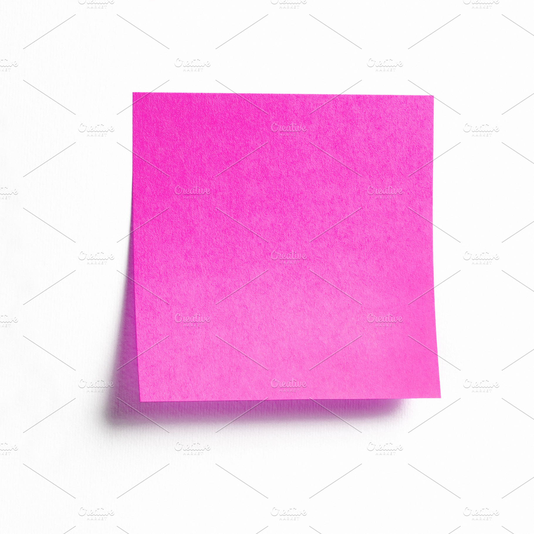 Pink sticky note on white background, a Business Photo by BOOCYS
