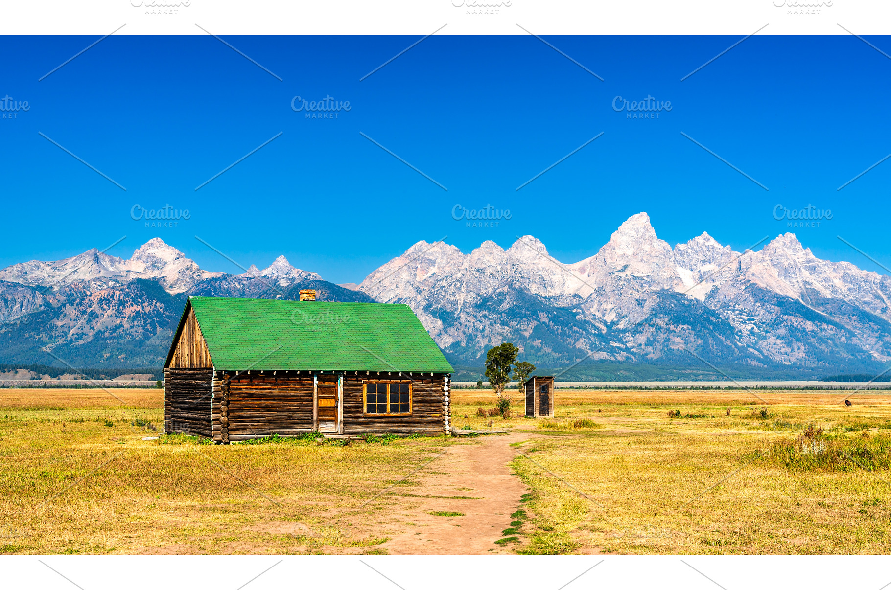 Log cabin at Mormon Row with Teton, a Nature Photo by Leonid Andronov