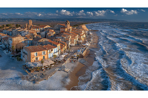 A Mediterranean village perched on a, a Nature Photo by ZinetroN