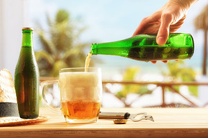 Drinking beer on table with appetizers on beach terrace, a Food & Drink Photo by Davizro's Market