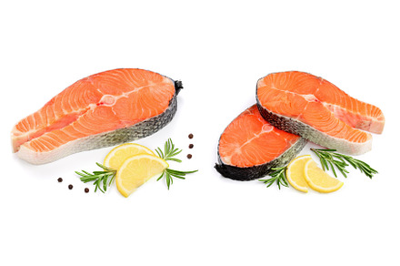 Slice of red fish salmon with lemon, a Food & Drink Photo by NataPhoto