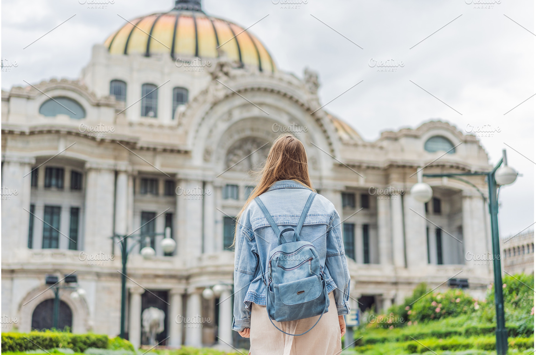 Woman tourist standing in front of, an Architecture Photo by Elizaveta Galitskaya