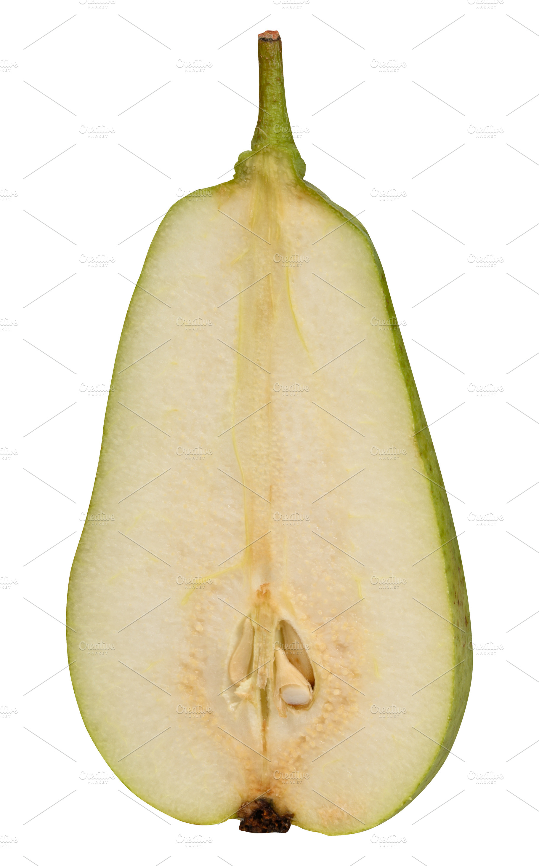 Half of a ripe green pear in a cross section with visible pit an, a Food & Drink Photo by ndanko