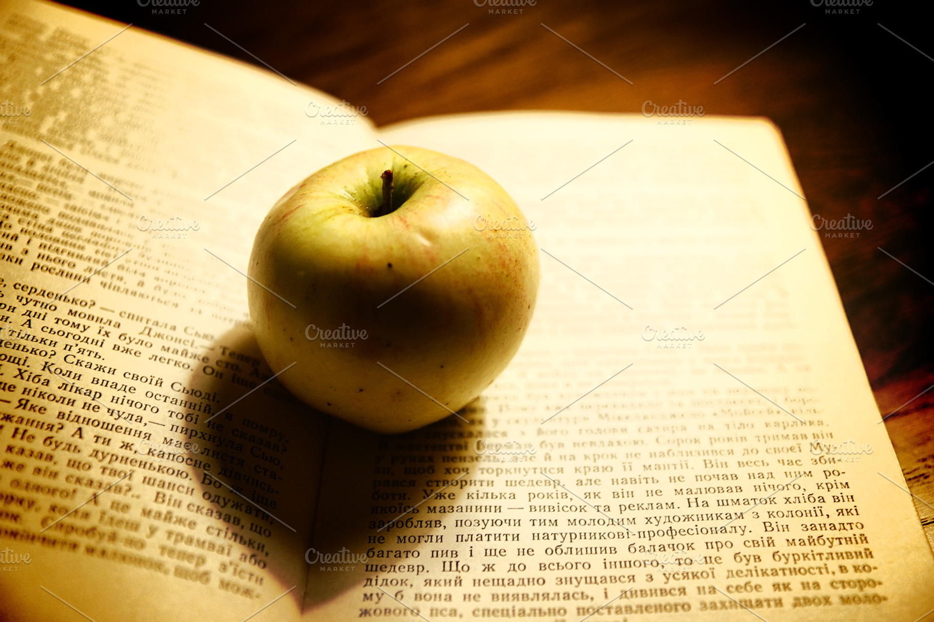 Apple On The Book, an Arts & Entertainment Photo by Nazar Hrabovyi