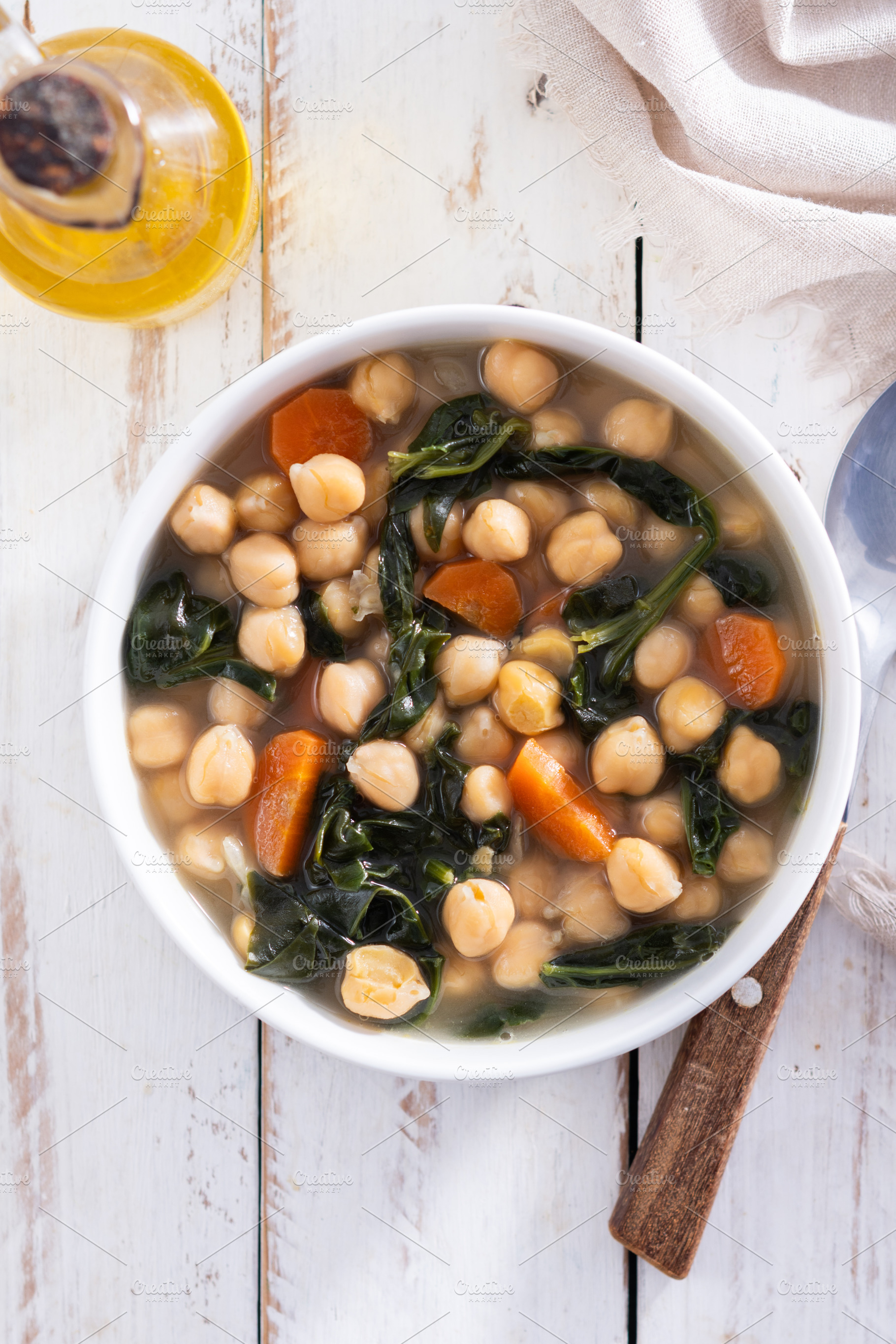 Chickpea and Spinach Soup with Carrots in White Bowl, a Food & Drink Photo by etorres69