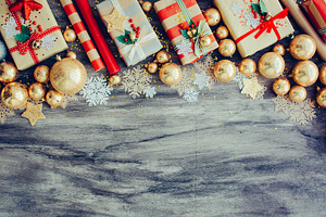 Christmas background with gift boxes featuring light, red, and abstract