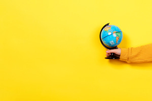 Hand Holding Small Globe, a School & Education Photo by Ales Munt