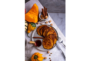 Pumpkin pancakes with maple syrup, a Food & Drink Photo by Yulia Furman