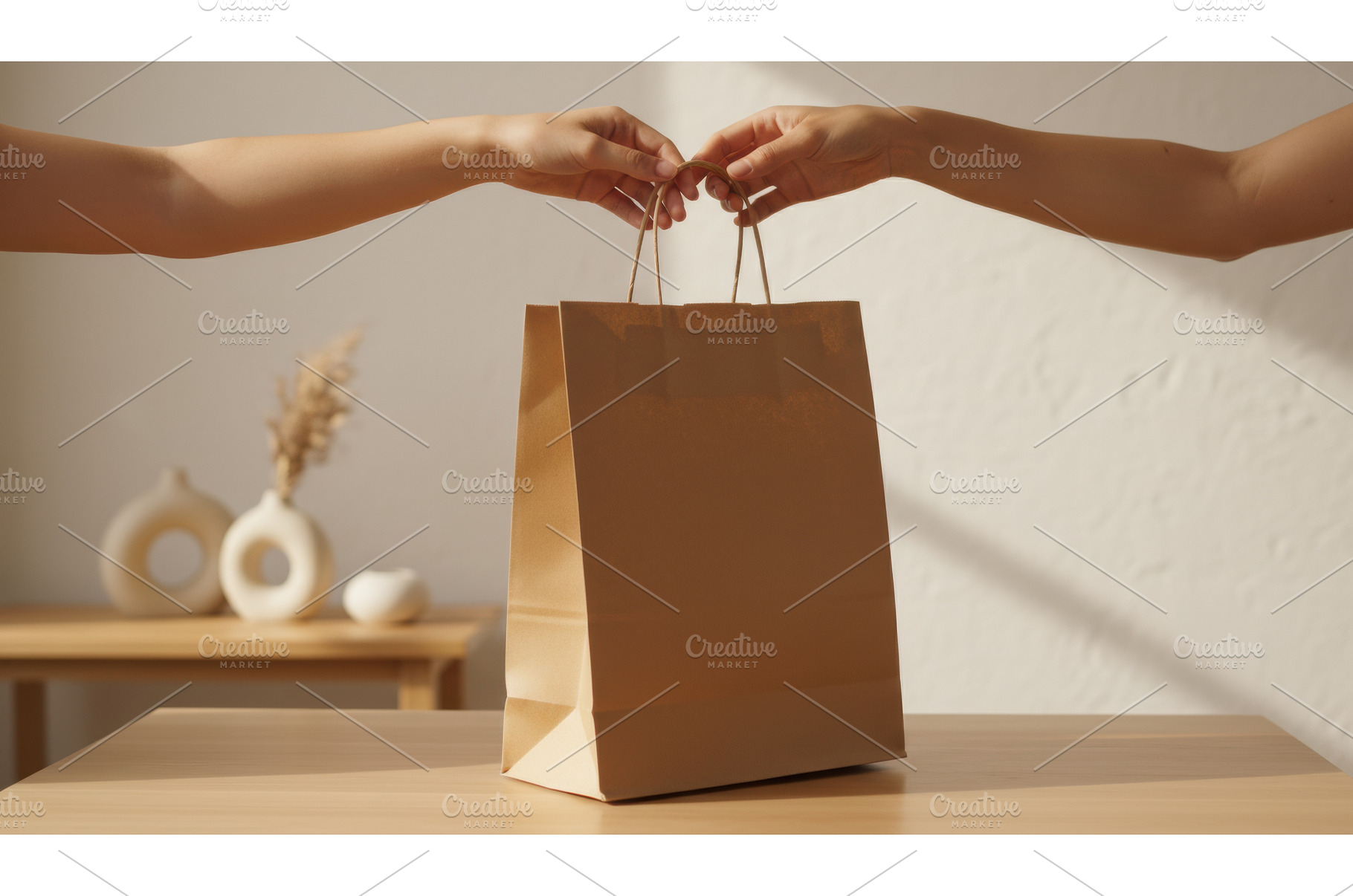 Two people hands holding brown paper, a Person Photo by Igor Tichonow