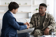 Happy black soldier in military uniform showing his smartphone, mockup, a Photo by Prostock-Studio (Thumbnail 5 of 6)