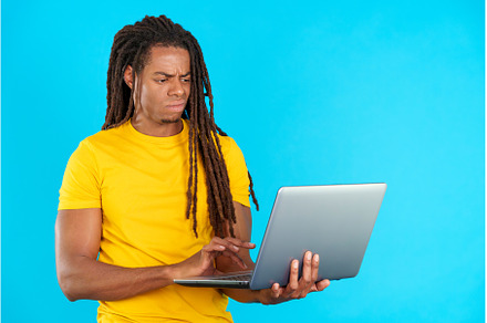 Latin man with dreadlocks having a, a Person Photo by Iván Moreno STOCK PHOTO