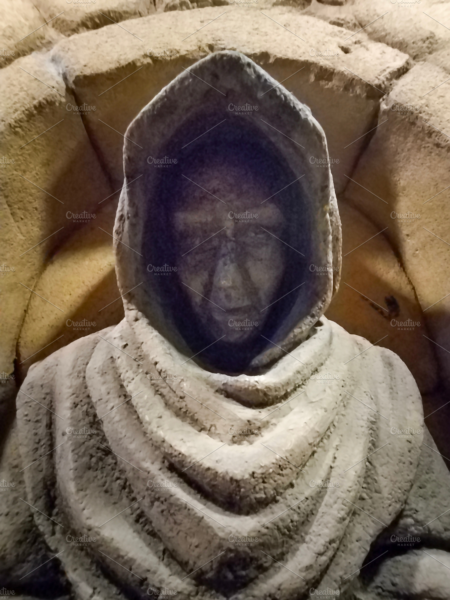 Hooded faceless statue in stone cloak, an Arts & Entertainment Photo by DanFLCreativo