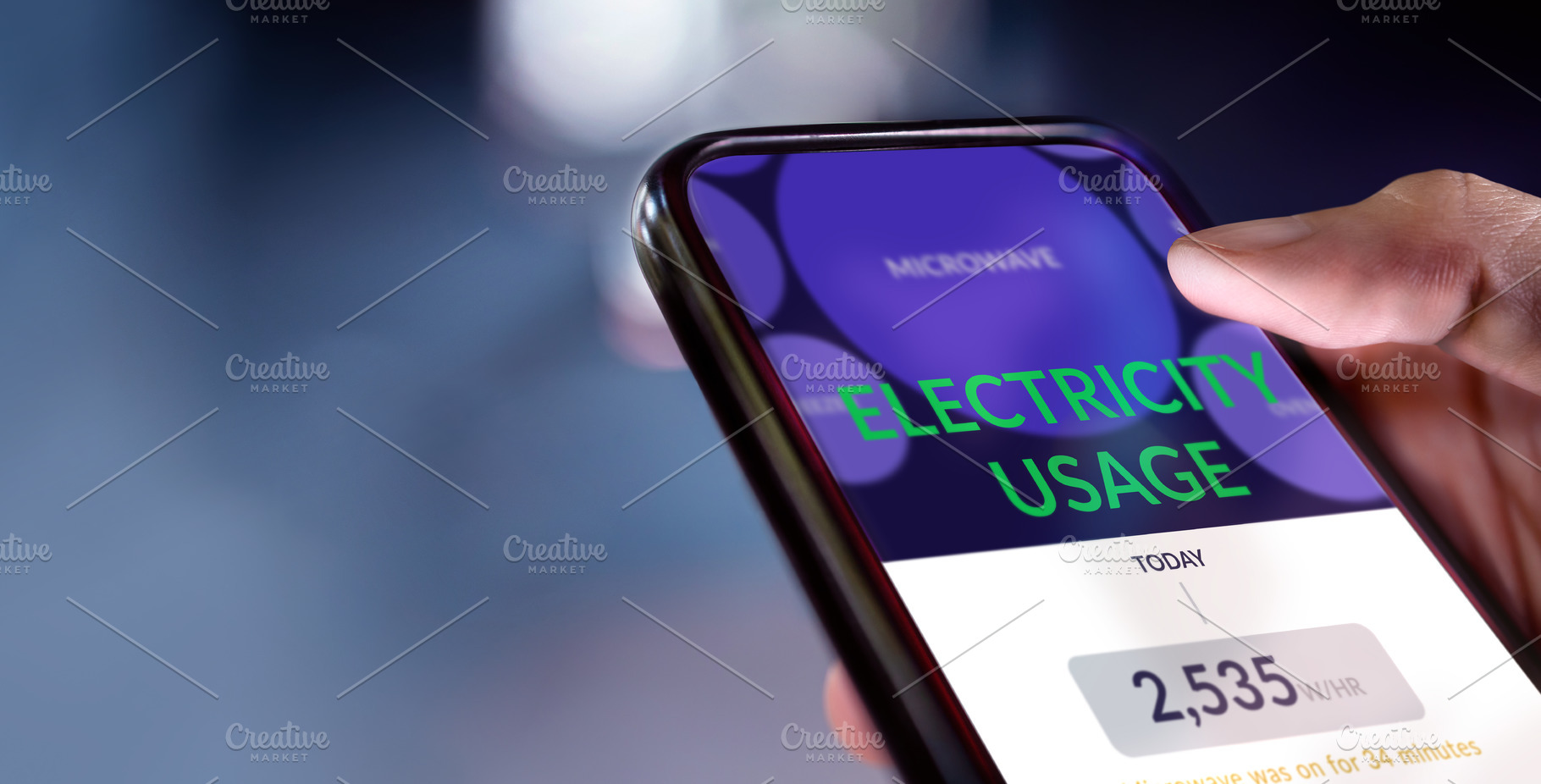 Closeup of Hand Using Home Electric Usage Application to Mornito, a Photo by salmon.black