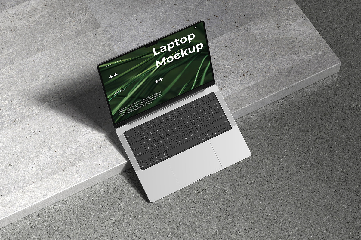 MacBook Pro 14 Mockup, a Mac Mockup by Graphicbars (Photo 5 of 13)
