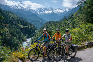 Three friends enjoying a picturesque, a Photo by Pavel_design