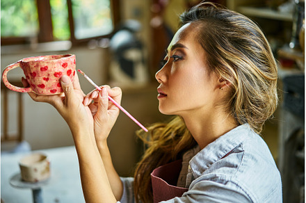 Female artist decorating and, an Arts & Entertainment Photo by Gladkov photography