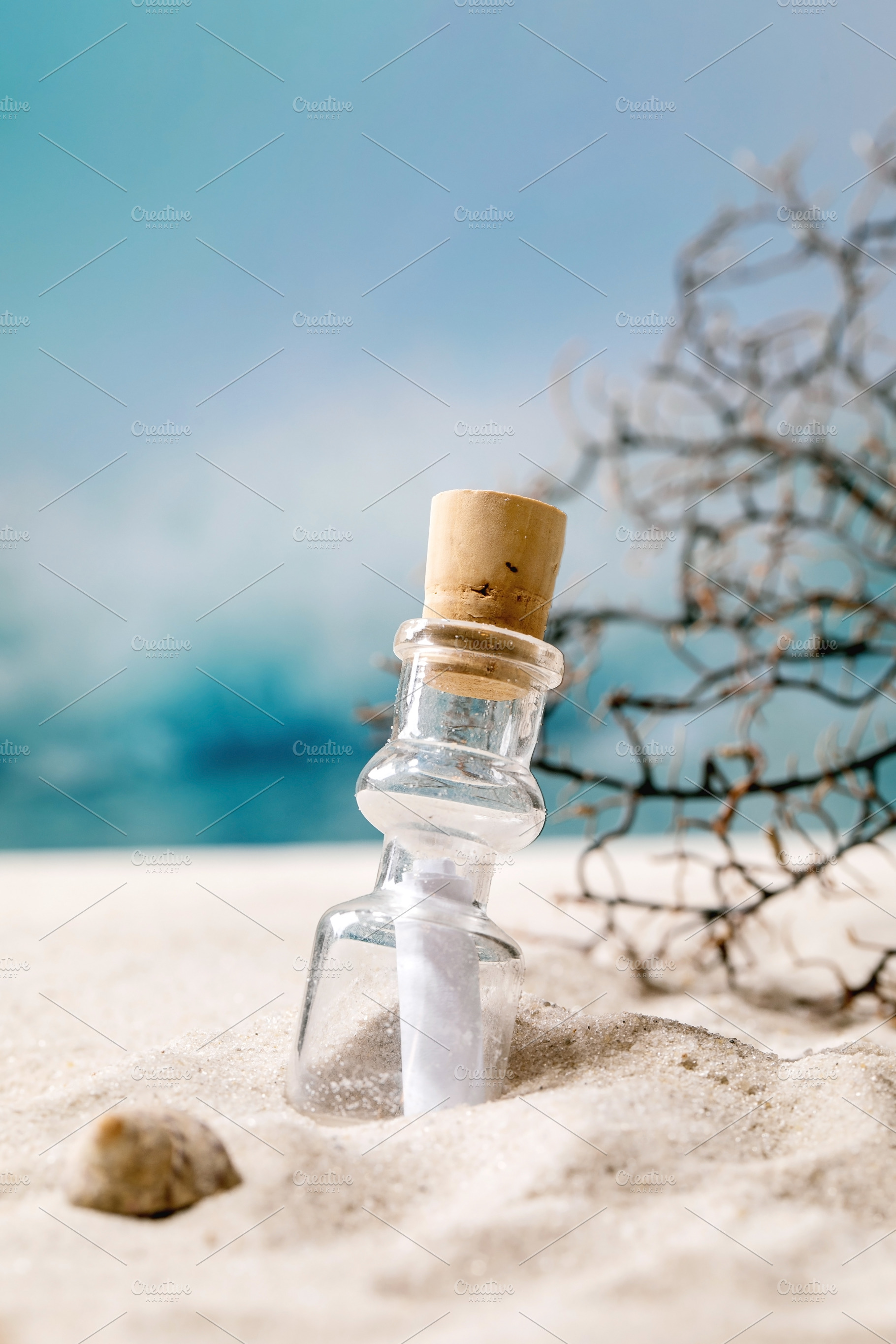 Summer sand sea beach with waves and glass botle with message, a Nature Photo by Natasha Breen