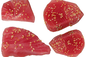Fresh tuna steaks sprinkled with sesame seeds, red flesh, four p, a Food & Drink Photo by ndanko