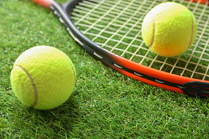 Tennis Balls and Racquet on Grass, a Sports & Recreation Photo by Davizro's Market
