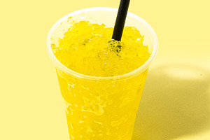 Yellow Slushie Drink in Plastic Cup, a Photo by etorres69