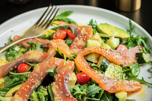 Salad with salted salmon and arugula, a Food & Drink Photo by Budarinphoto