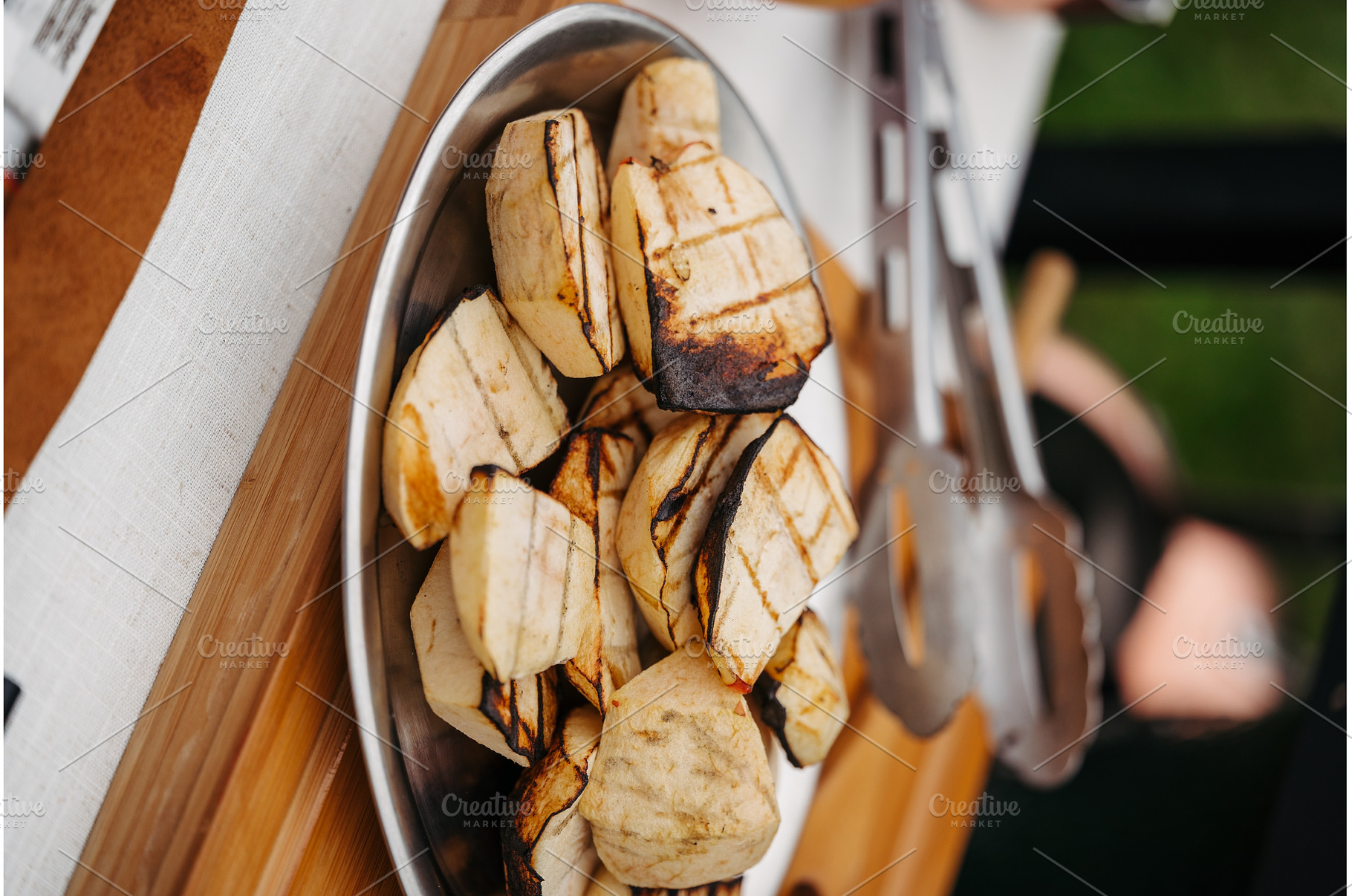 Grilled apple slices with char marks, a Nature Photo by HalfPoint