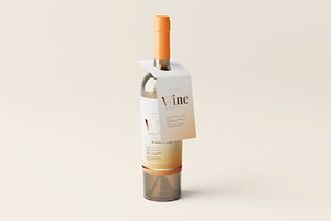 Wine bottle with a tag mockup, a Packaging Mockup by MockupFree.Net