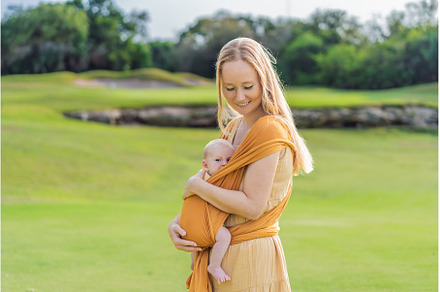 Mother holding her little baby in a