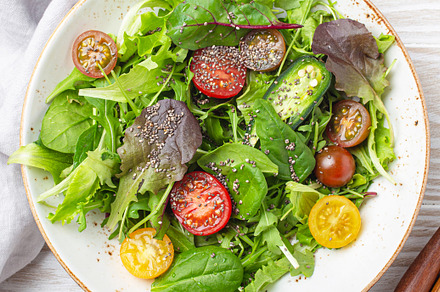 Vegetables vegetarian healthy salad with red yellow cherry tomat, a Background Photo by its_al_dente
