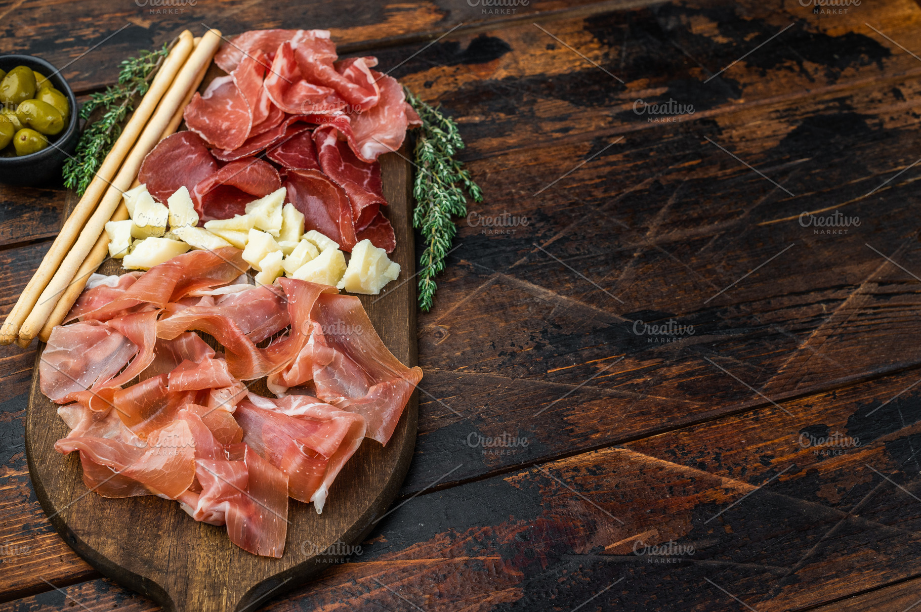 Gourmet charcuterie platter featuring Italian salumi, cheese cub, a Food & Drink Photo by composter-box@mail.ru