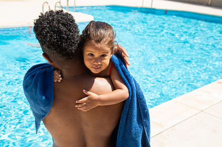 Cute kid hugging anonymous father, a Holiday Photo by Benii_photography