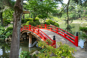 Red bridge in Shukkei-en Japanese garden in Hiroshima, Japan, an Architecture Photo by GoodGoods