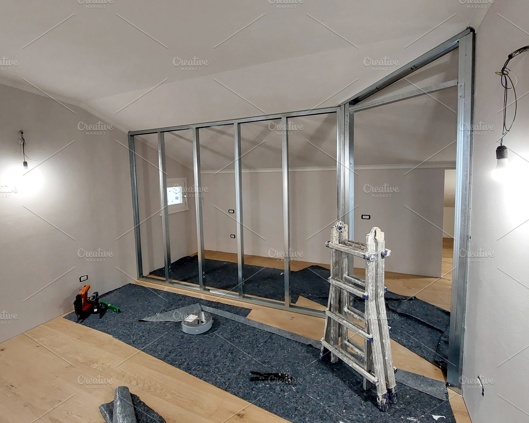 Metal frame for plasterboard wall installation in a new attic room, an Architecture Photo by Antonio Gravante Market