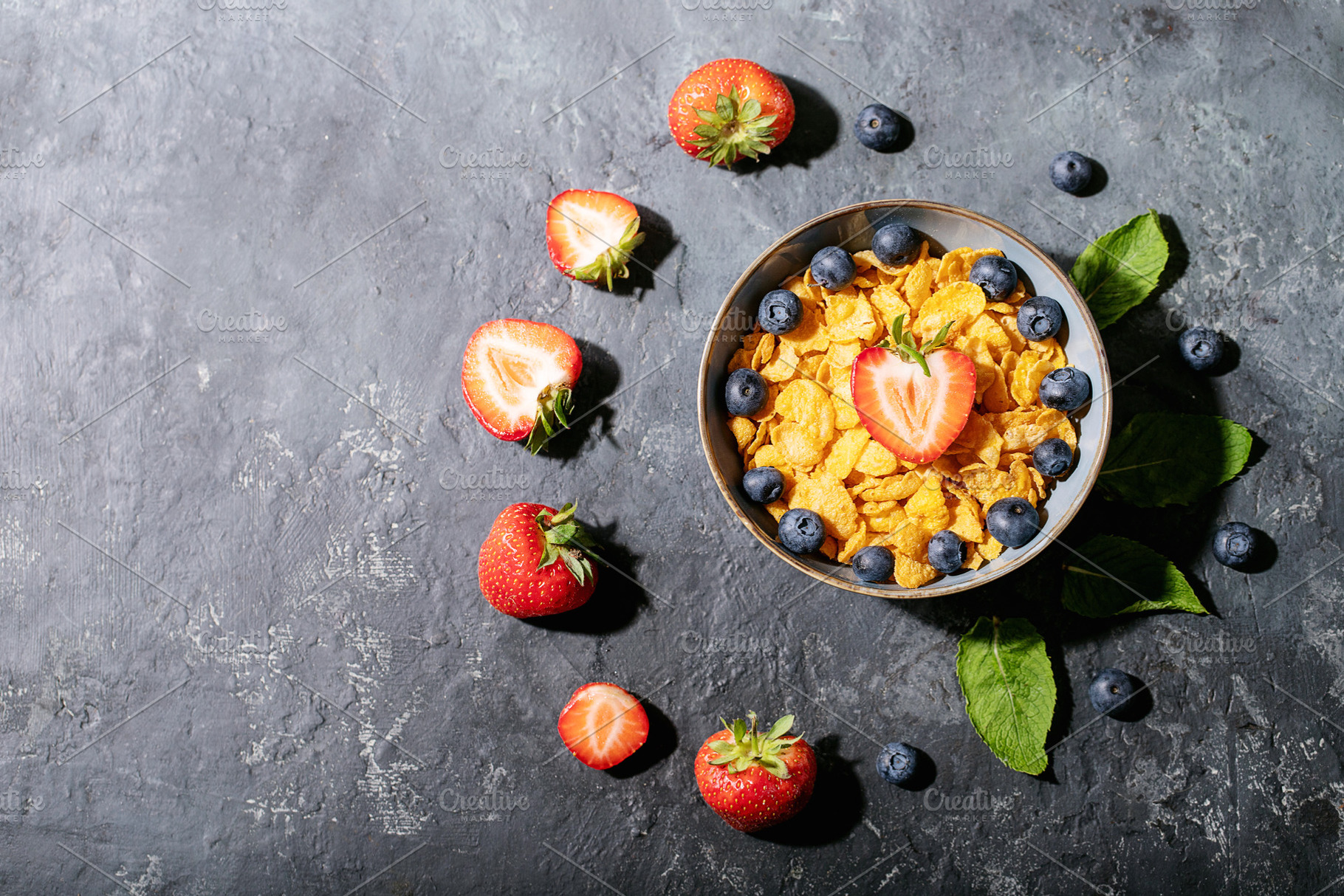 Golden cerials served with strawberr stock photo containing bowl and morning, a Food & Drink Photo by RomanDebree