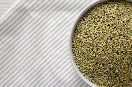 Organic Dried Rosemary in a Bowl, overhead view. Flat lay, top v, a Food & Drink Photo by LiudmylaChuhunova