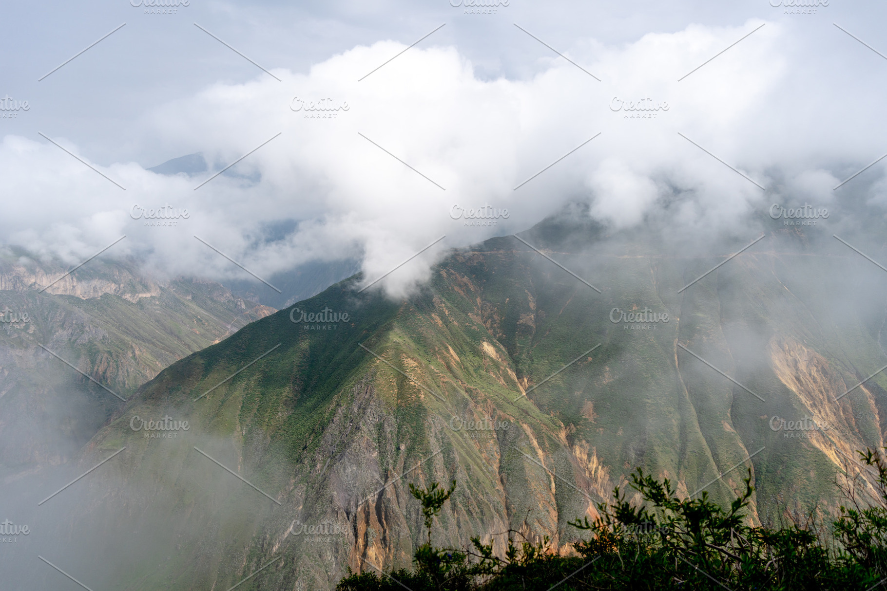 Colca Canyon in the mist and clouds, Peru, a Photo by GoodGoods