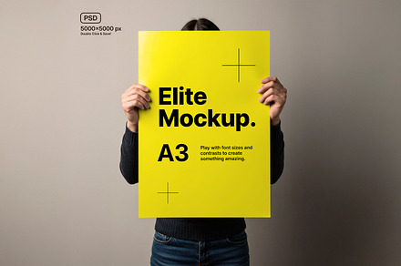 Woman Holding A3 Poster, an Advertising Mockup by Elite Mockups