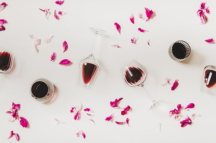 Flat-lay of glasses with red wine, a Food & Drink Photo by Foxys