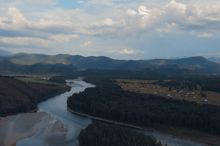 Majestic river Katun in valley of Altai under dramatic sky, a Nature Photo by TravelFlow