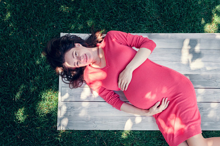 Pregnant girl dressed in pink dress,, a Person Photo by Eni_fly