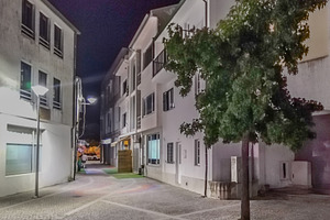 Quiet street at night in residential area, an Architecture Photo by DanFLCreativo