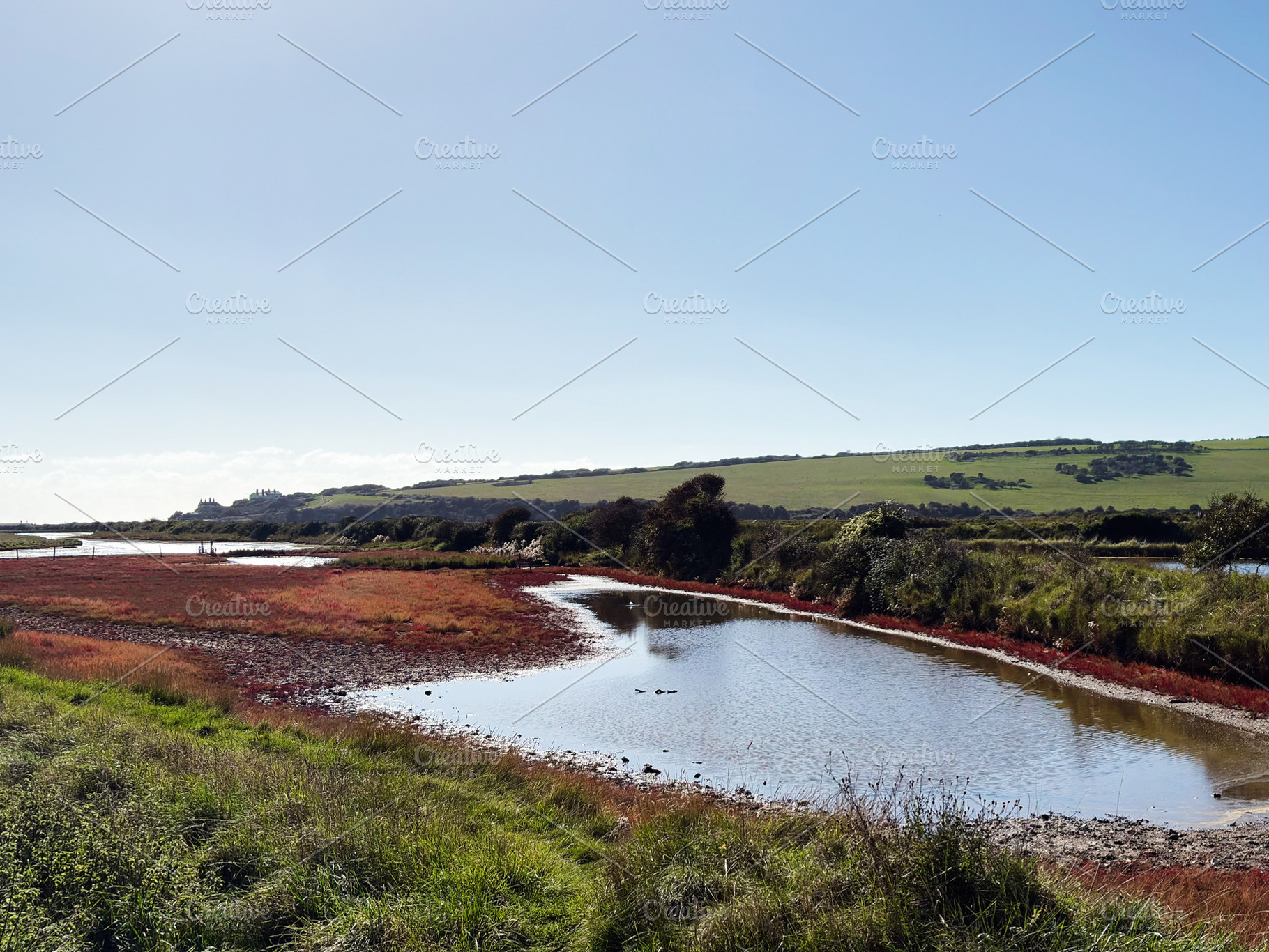Scenic river bend at Seven Sisters Cliffs in East Sussex UK under clear blue sk, a Nature Photo by AS photostudio