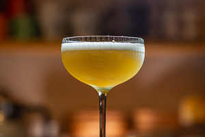 Elegant cocktail with citrus foam