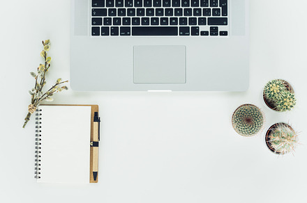 White desktop featuring top, desktop, and laptop