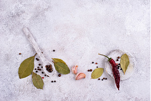 Culinary background with pepper, bay, a Food & Drink Photo by Yulia Furman