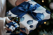 Gift Wrap Mockup w. Hands WR004-01, a Books & Magazine Mockup by Callistemon Creative (Thumbnail 3 of 8)