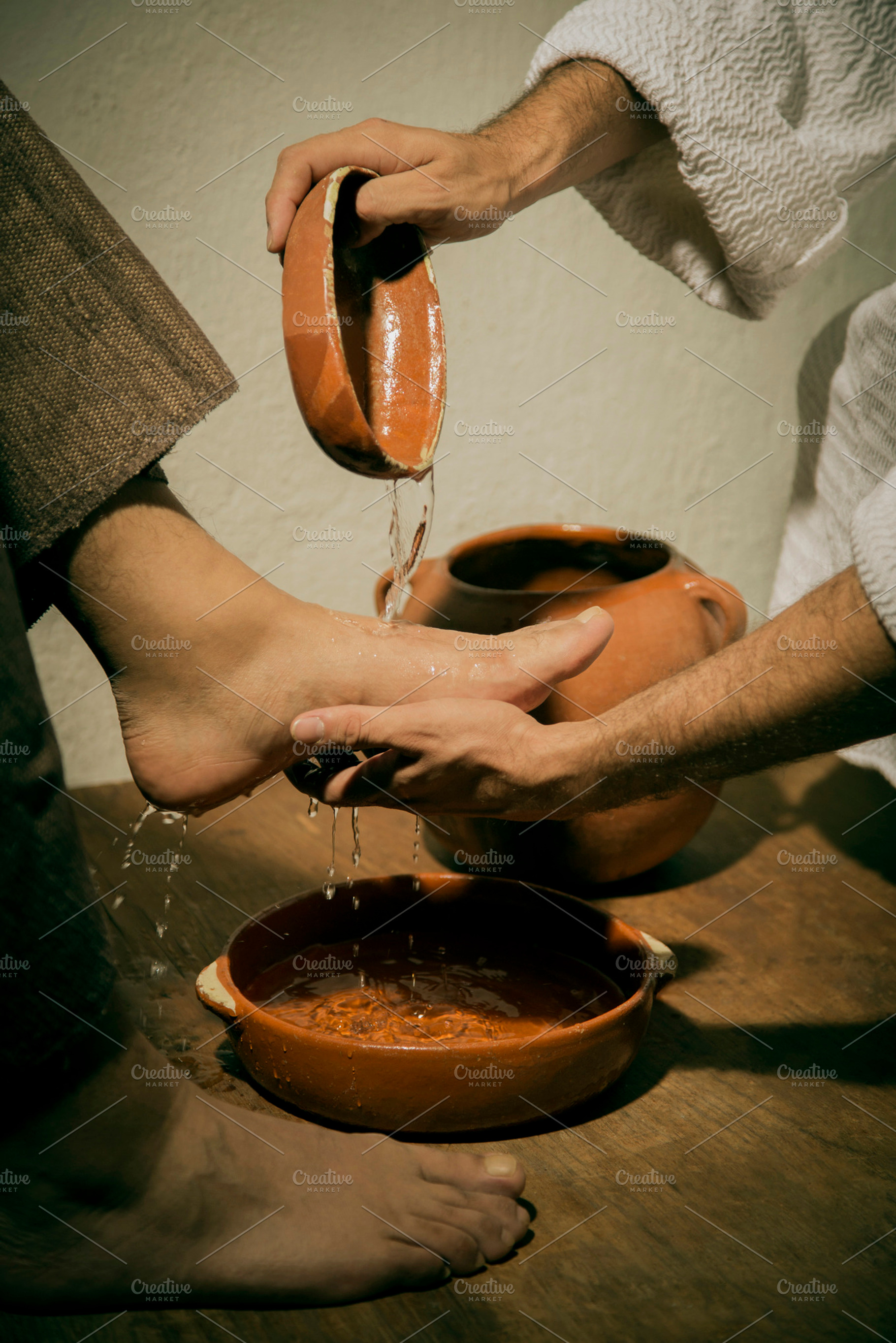 Jesus christ washing the feet featuring catholic, communion, and eternal, a Person Photo by Mexico stock images
