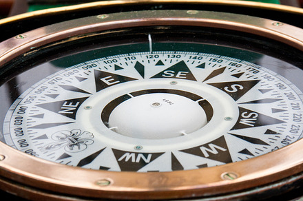 Compass featuring activity, board, and boat, a Transportation Photo by TalyaPhoto